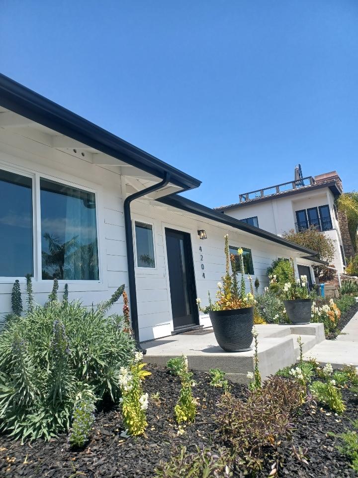 seamless gutters on a house in orange county - Tuxedo wrap